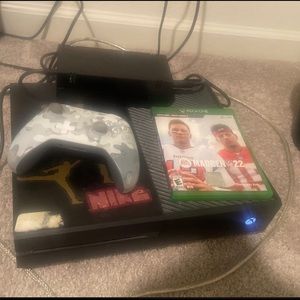 Xbox with controller and game